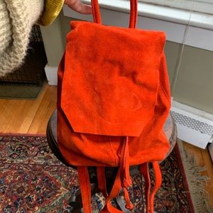 Mini ASOS rust colored draw string backpack